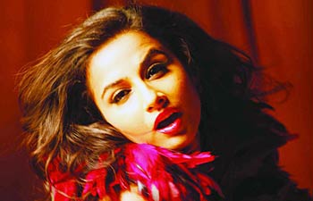 Vidya Balan riding high on her 'dirty' act with elan